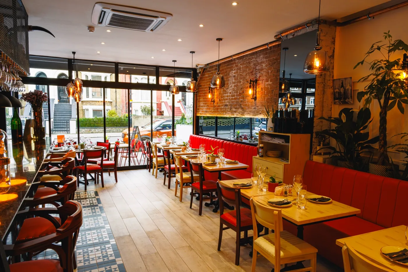 The dining room laid out for a group, seen from the entrance